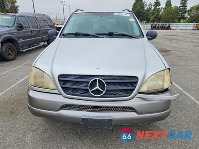 Piąte zdjęcie samochodu w środku: 1999 MERCEDES-BENZ ML 320 VIN:4JGAB54E0XA138381 - miniatura