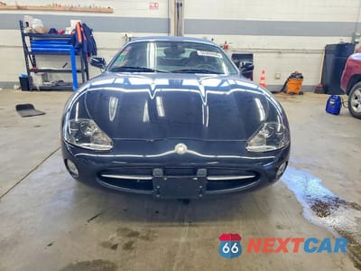 Piąte zdjęcie samochodu w środku: 2003 JAGUAR XK8 VIN:SAJDA42C232A32507 - miniatura