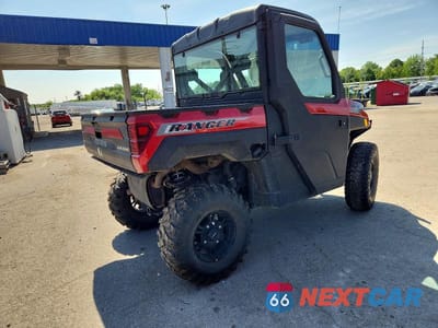 Czwarte zdjęcie samochodu z boku: 2024 POLARIS RANGER XP 1000 UTILITY VEHICLE VIN:4XARRU992S8769049 - miniatura
