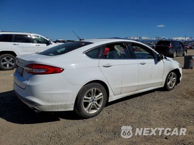 Trzecie zdjęcie samochodu z tyłu: 2018 FORD FOCUS VIN:3FA6P0H75JR220748 - miniatura