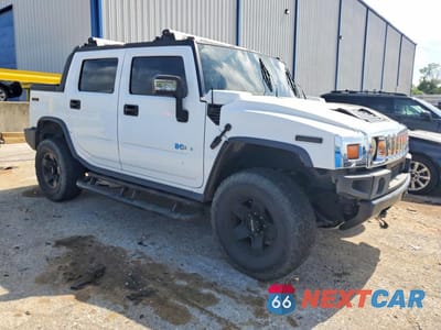 Czwarte zdjęcie samochodu z boku: 2006 HUMMER H2 SUT VIN:5GRGN22U06H118375 - miniatura