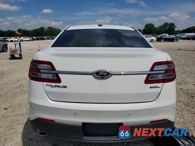 Zdjęcie 6 z 12 samochodu: 2017 FORD TAURUS SEL VIN:1FAHP2E80HG114467 - miniatura
