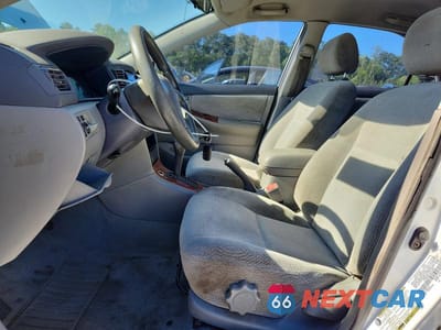 Zdjęcie 7 z 12 samochodu: 2004 TOYOTA COROLLA LE VIN:2T1BR32E94C318655 - miniatura