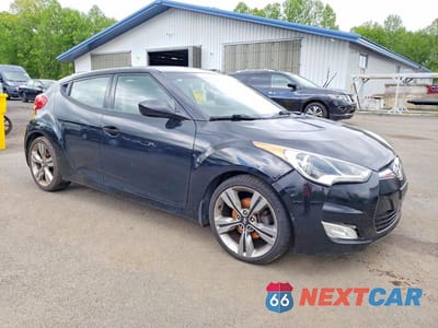 Czwarte zdjęcie samochodu z boku: 2013 HYUNDAI VELOSTER BASE VIN:KMHTC6AD3DU099190 - miniatura
