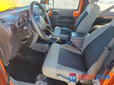 Zdjęcie 7 z 12 samochodu: 2010 JEEP WRANGLER SPORT VIN:1J4AA2D17AL187196 - miniatura