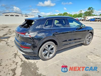 Trzecie zdjęcie samochodu z tyłu: 2022 AUDI Q4 E-TRON PREMIUM VIN:WA1G2BFZ2NP033956 - miniatura