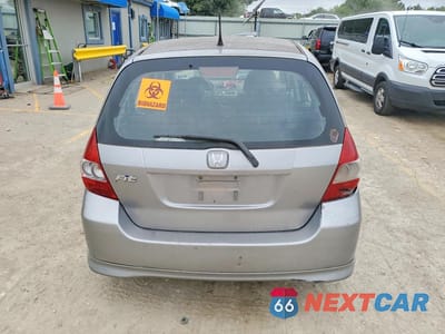 Zdjęcie 6 z 12 samochodu: 2007 HONDA FIT S VIN:JHMGD38657S049981 - miniatura