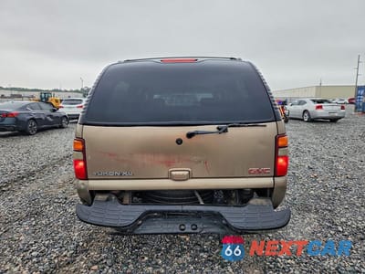Zdjęcie 6 z 13 samochodu: 2003 GMC YUKON XL C1500 VIN:1GKEC16Z53J172987 - miniatura