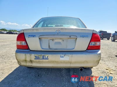 Zdjęcie 6 z 12 samochodu: 1999 MAZDA PROTEGE DX VIN:JM1BJ2228X0194402 - miniatura