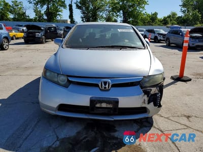 Piąte zdjęcie samochodu w środku: 2007 HONDA CIVIC LX VIN:1HGFA16517L001040 - miniatura