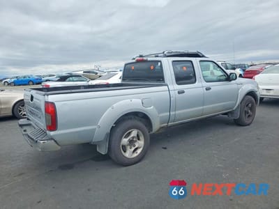 Trzecie zdjęcie samochodu z tyłu: 2002 NISSAN FRONTIER CREW CAB SC VIN:1N6MD29Y52C384494 - miniatura
