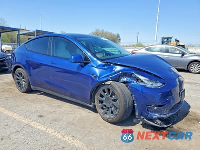 Czwarte zdjęcie samochodu z boku: 2022 TESLA MODEL Y VIN:7SAYGDEE4NF458307 - miniatura