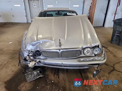 Piąte zdjęcie samochodu w środku: 2000 JAGUAR XJR VIN:SAJDA15B9YMF18129 - miniatura