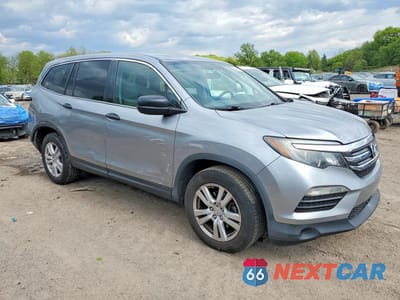 Czwarte zdjęcie samochodu z boku: 2016 HONDA PILOT LX VIN:5FNYF6H15GB086614 - miniatura