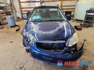 Piąte zdjęcie samochodu w środku: 2004 TOYOTA COROLLA S VIN:1NXBR32E44Z270058 - miniatura