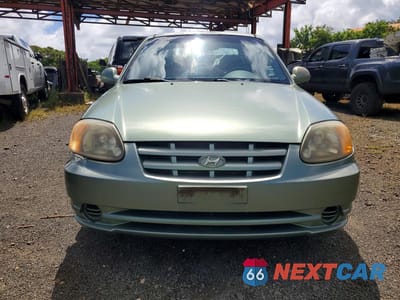 Piąte zdjęcie samochodu w środku: 2003 HYUNDAI ACCENT GL VIN:KMHCG45C33U429984 - miniatura