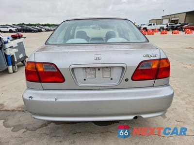 Zdjęcie 6 z 12 samochodu: 1999 HONDA CIVIC LX VIN:1HGEJ6672XL043291 - miniatura