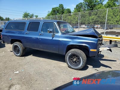 Czwarte zdjęcie samochodu z boku: 1991 CHEVROLET SUBURBAN V2500 VIN:1GNGV26K9MF122743 - miniatura