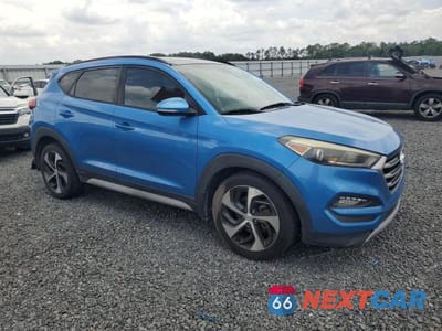 Czwarte zdjęcie samochodu z boku: 2018 HYUNDAI TUCSON VALUE VIN:KM8J33A26JU696415 - miniatura
