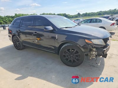 Czwarte zdjęcie samochodu z boku: 2010 LINCOLN MKT VIN:2LMHJ5FRXABJ19306 - miniatura