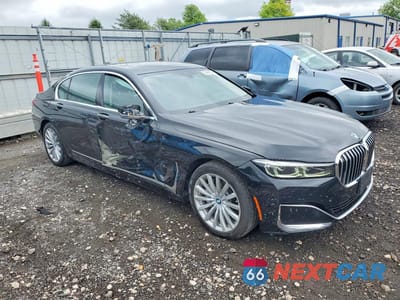 Czwarte zdjęcie samochodu z boku: 2022 BMW 740 XI VIN:WBA7T4C0XNCH65392 - miniatura