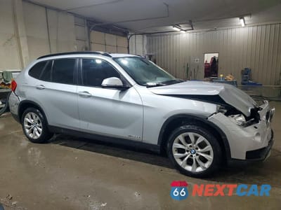 Czwarte zdjęcie samochodu z boku: 2014 BMW X1 XDRIVE28I VIN:WBAVL1C51EVY21576 - miniatura