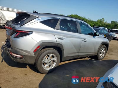 Trzecie zdjęcie samochodu z tyłu: 2023 HYUNDAI TUCSON SEL VIN:5NMJBCAE4PH218432 - miniatura