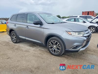 Czwarte zdjęcie samochodu z boku: 2017 MITSUBISHI OUTLANDER ES VIN:JA4AZ2A31HZ051720 - miniatura
