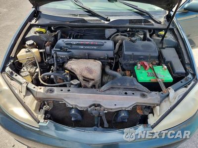 Zdjęcie 11 z 12 samochodu: 2003 TOYOTA CAMRY LE VIN:4T1BE32K23U704154 - miniatura