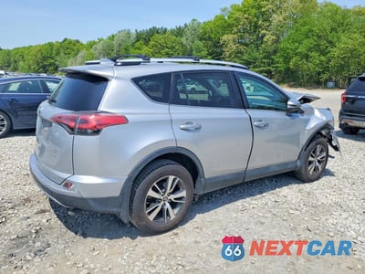 Trzecie zdjęcie samochodu z tyłu: 2016 TOYOTA RAV4 XLE VIN:2T3RFREV6GW502113 - miniatura