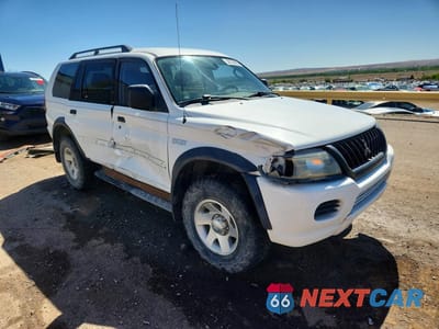 Czwarte zdjęcie samochodu z boku: 2003 MITSUBISHI MONTERO SPORT ES VIN:JA4MT21H93J032981 - miniatura
