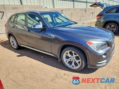 Czwarte zdjęcie samochodu z boku: 2014 BMW X1 XDRIVE28I 4D SUV VIN:WBAVL1C55EVY18180 - miniatura