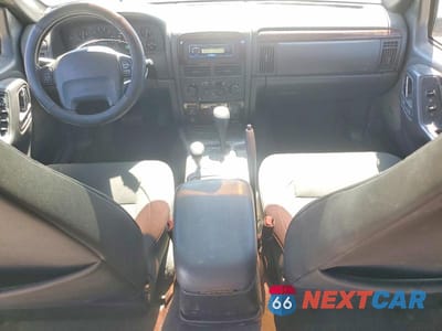 Zdjęcie 8 z 13 samochodu: 2000 JEEP GRAND CHEROKEE LIMITED VIN:1J4GW58N0YC359038 - miniatura