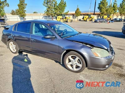 Czwarte zdjęcie samochodu z boku: 2006 NISSAN ALTIMA 2.5 VIN:1N4AL11D46N355757 - miniatura