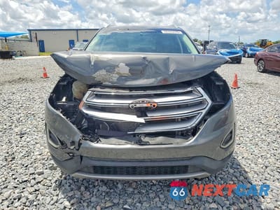 Piąte zdjęcie samochodu w środku: 2018 FORD EDGE TITANIUM VIN:2FMPK3K9XJBC49682 - miniatura
