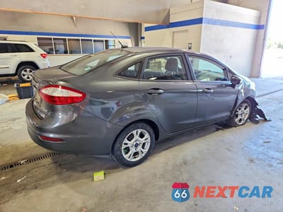 Trzecie zdjęcie samochodu z tyłu: 2016 FORD FIESTA SE VIN:3FADP4BJ7GM162196 - miniatura