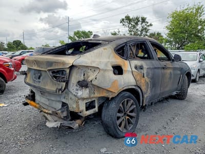 Trzecie zdjęcie samochodu z tyłu: 2019 BMW X6 SDRIVE35I VIN:5UXKU0C52K0H98767 - miniatura
