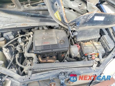 Zdjęcie 12 z 13 samochodu: 2002 TOYOTA SIENNA XLE VIN:4T3ZF13C42U477742 - miniatura