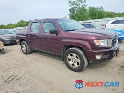 Czwarte zdjęcie samochodu z boku: 2010 HONDA RIDGELINE RT VIN:5FPYK1F20AB012350 - miniatura