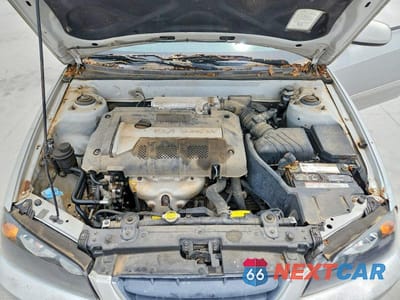 Zdjęcie 11 z 12 samochodu: 2005 HYUNDAI ELANTRA GLS VIN:KMHDN46D25U166178 - miniatura