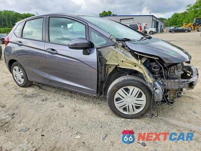 Czwarte zdjęcie samochodu z boku: 2019 HONDA FIT LX VIN:3HGGK5H4XKM704222 - miniatura