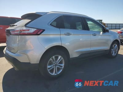 Trzecie zdjęcie samochodu z tyłu: 2019 FORD EDGE SEL VIN:2FMPK3J90KBC74299 - miniatura