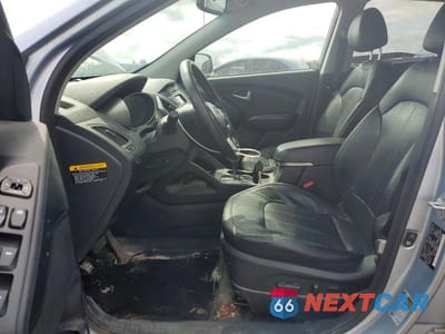 Zdjęcie 7 z 13 samochodu: 2011 HYUNDAI TUCSON GLS VIN:KM8JUCAC6BU223072 - miniatura