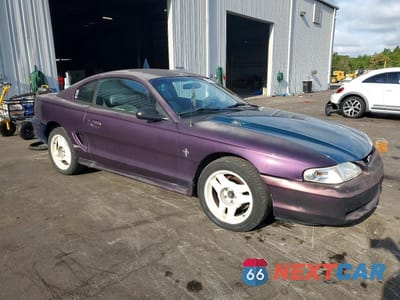 Czwarte zdjęcie samochodu z boku: 1996 FORD MUSTANG VIN:1FALP4042TF170001 - miniatura