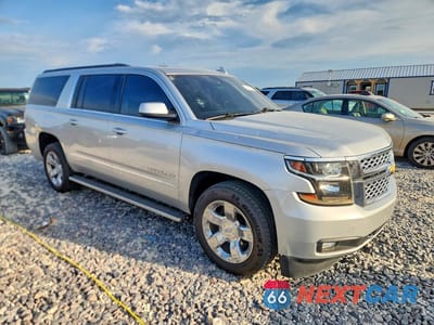 Czwarte zdjęcie samochodu z boku: 2018 CHEVROLET SUBURBAN K1500 LT VIN:1GNSKHKC3JR151993 - miniatura