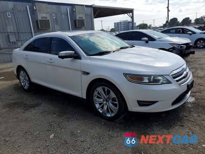 Czwarte zdjęcie samochodu z boku: 2011 FORD TAURUS LIMITED VIN:1FAHP2FW1BG118564 - miniatura