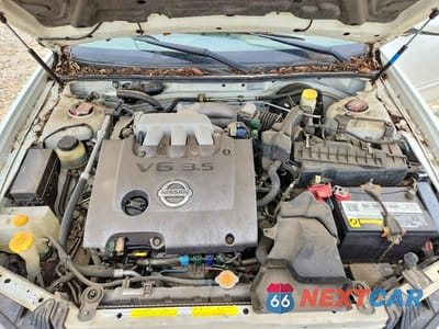 Zdjęcie 11 z 12 samochodu: 2003 NISSAN MAXIMA GXE VIN:JN1DA31A13T439768 - miniatura