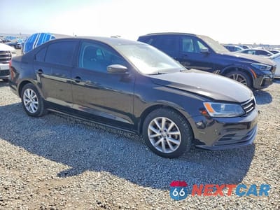 Czwarte zdjęcie samochodu z boku: 2015 VOLKSWAGEN JETTA SE VIN:3VWD17AJ5FM260962 - miniatura