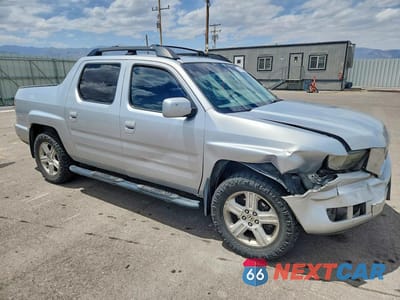 Czwarte zdjęcie samochodu z boku: 2011 HONDA RIDGELINE RTL VIN:5FPYK1F59BB004095 - miniatura