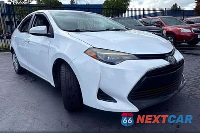 2018 TOYOTA COROLLA LE 5YFBURHE3JP840007 - główne zdjęcie licytacji z USA - miniatura